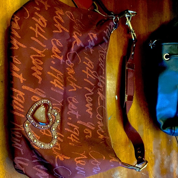 Coach Handbags - Authentic Coach Burgundy Fabric Shoulder Strap Purse. Heart detail.